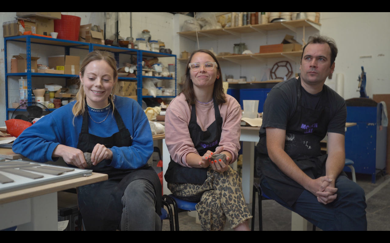 3 artists in a studio 